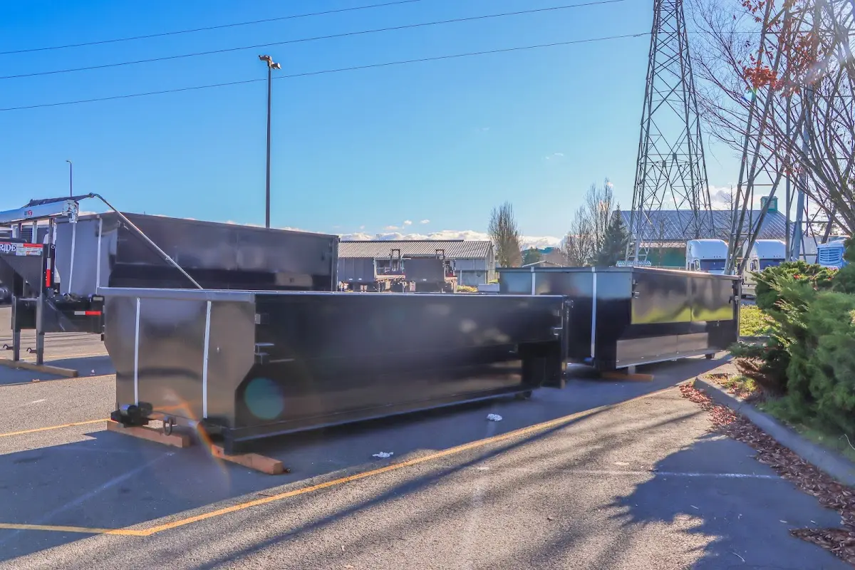 Roll-off dumpster ready for waste disposal at job site for 15 Yard Dumpster Rental in Fort Irwin